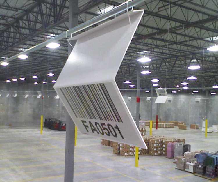 Z shaped overhead warehouse location sign