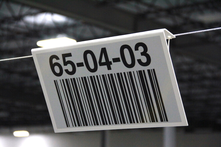 overhead warehouse location barcode sign