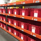 Warehouse totes with tracking labels