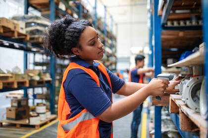 warehouse worker with barcode scan gun