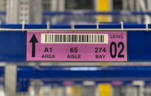 close up of warehouse magnet label on new racking