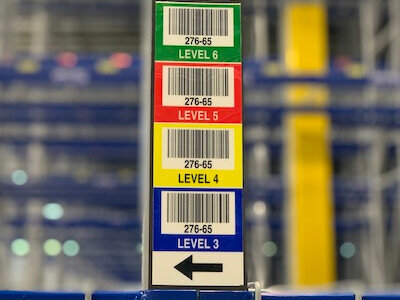 Close up of vertical warehouse totem label on magnet