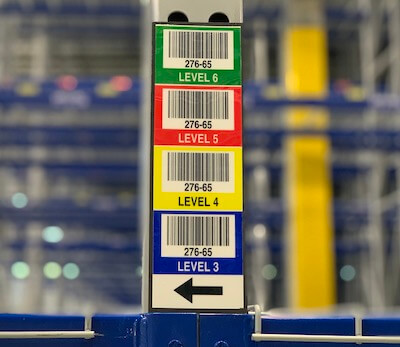 Close up of vertical warehouse totem label on magnet